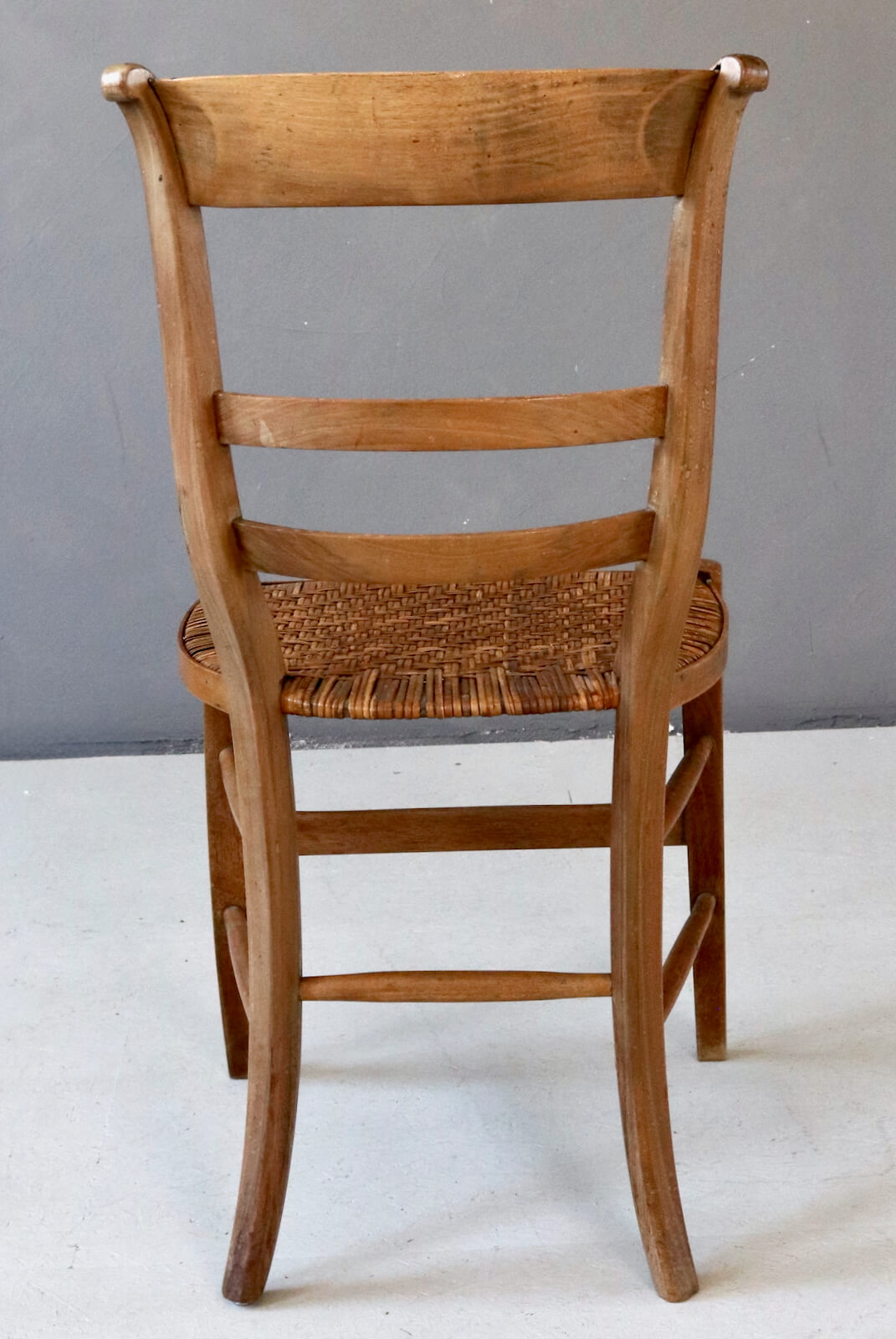 Antique wooden chair with wickerwork Antique wooden chair with wickerwork