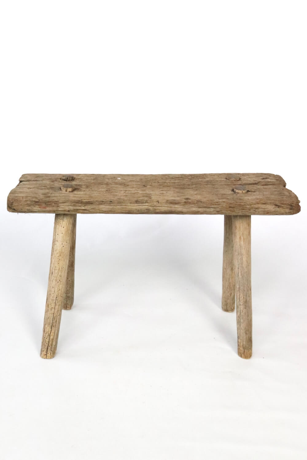 Old rustic farmers stool