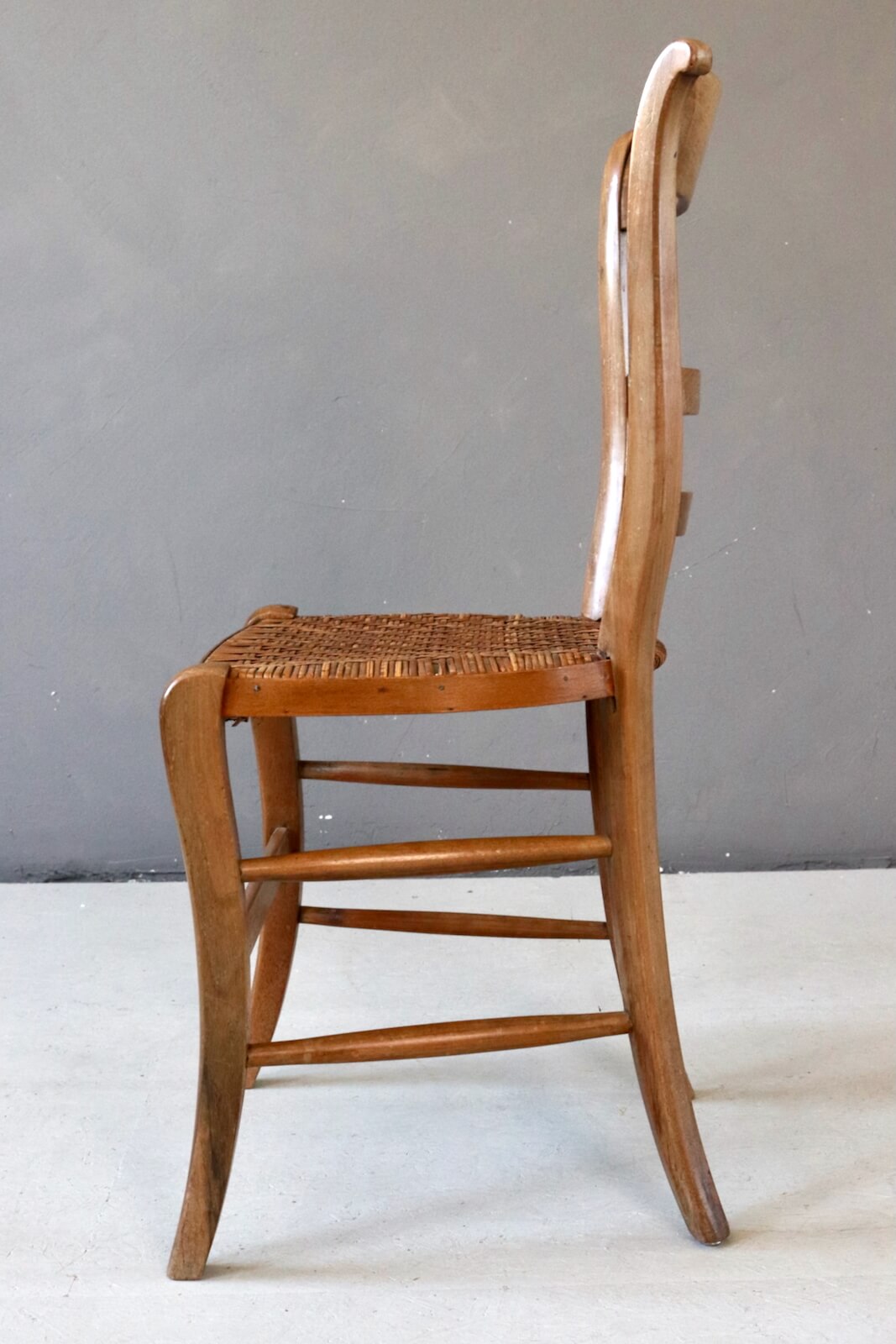 Antique wooden chair with wickerwork Antique wooden chair with wickerwork