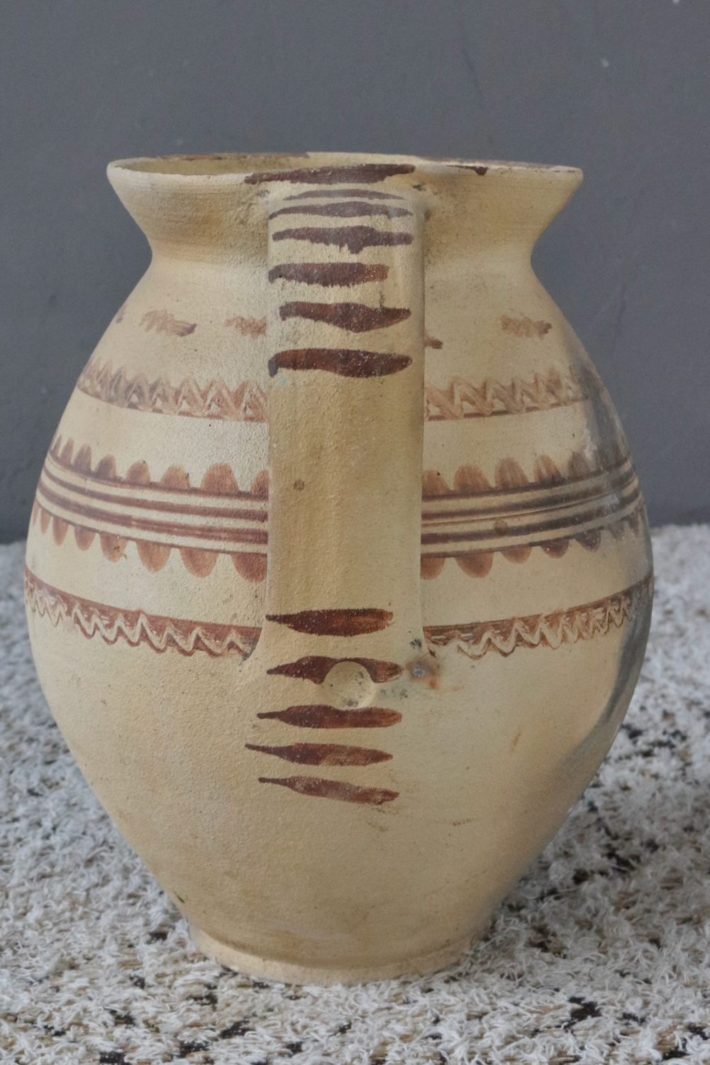 Antique terracotta jug