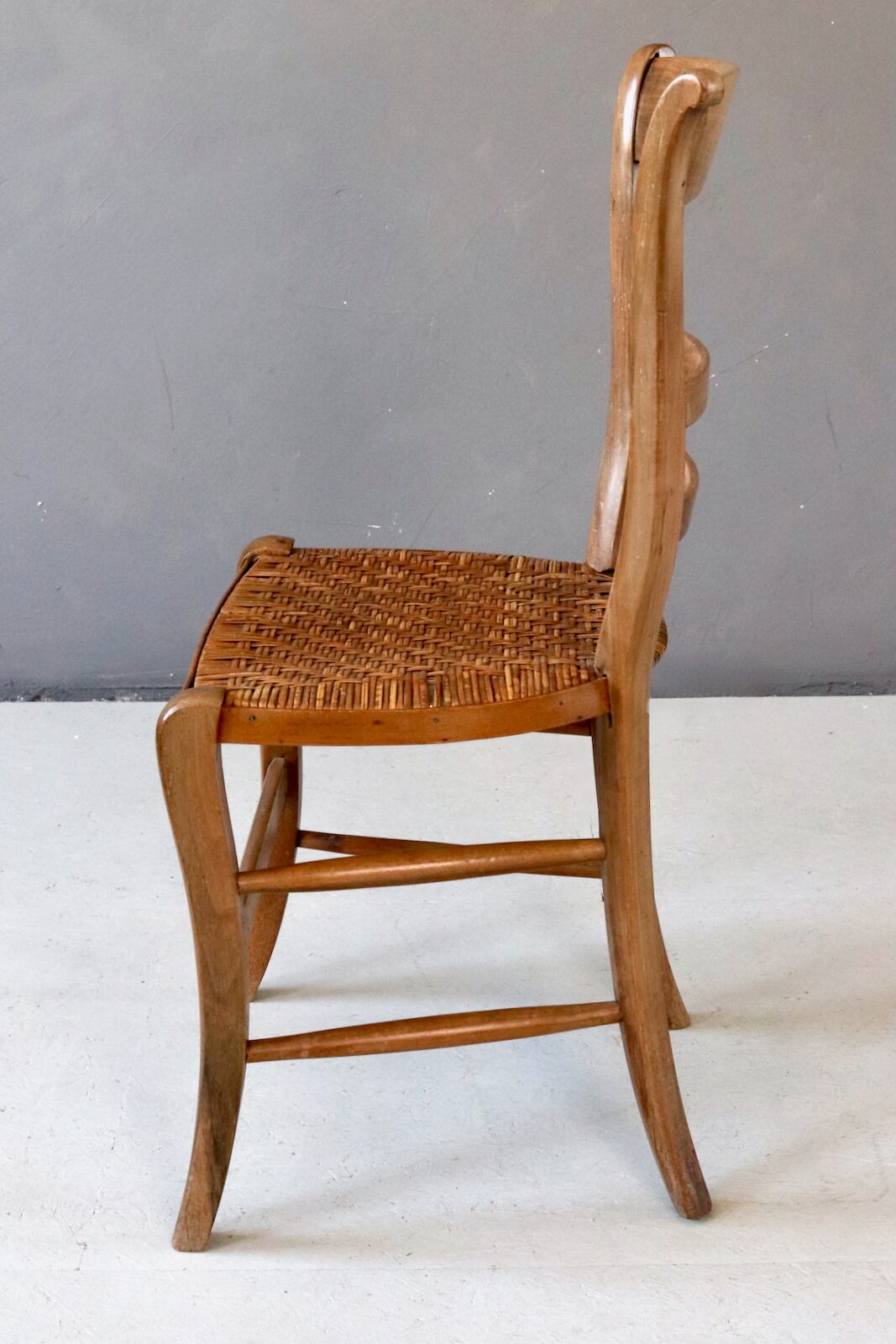 Antique wooden chair with wickerwork Antique wooden chair with wickerwork
