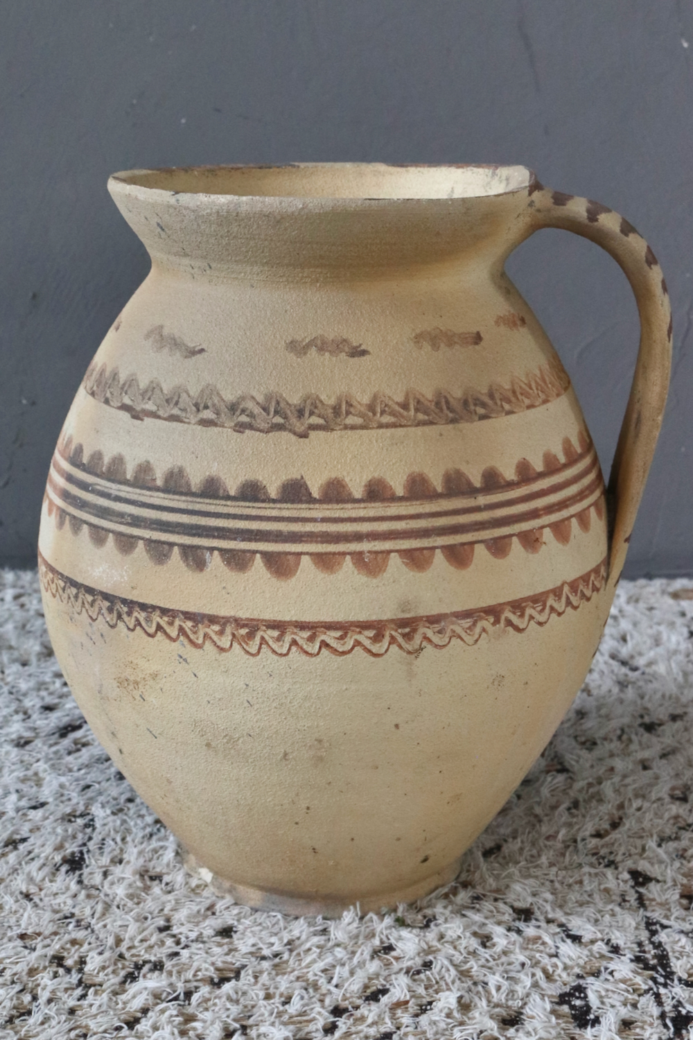 Antique terracotta jug