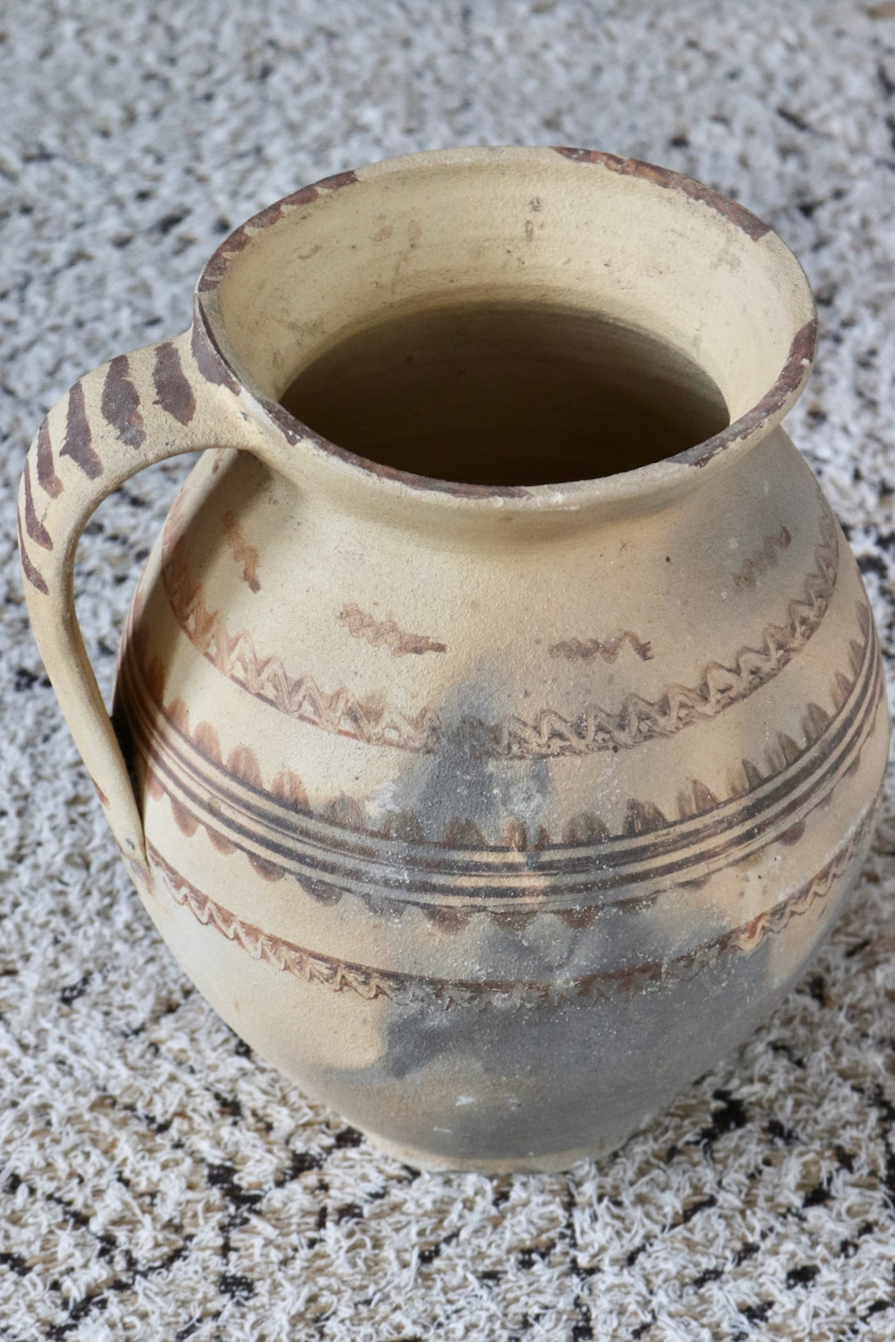 Antique terracotta jug