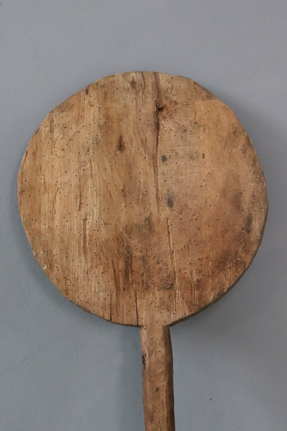 Ancient bread board with handle