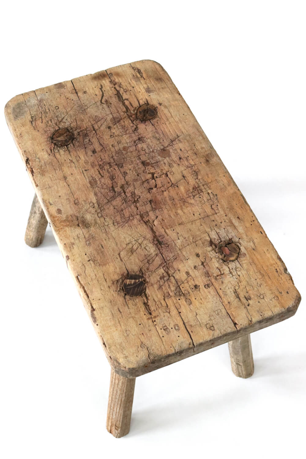 Old rustic farmers stool