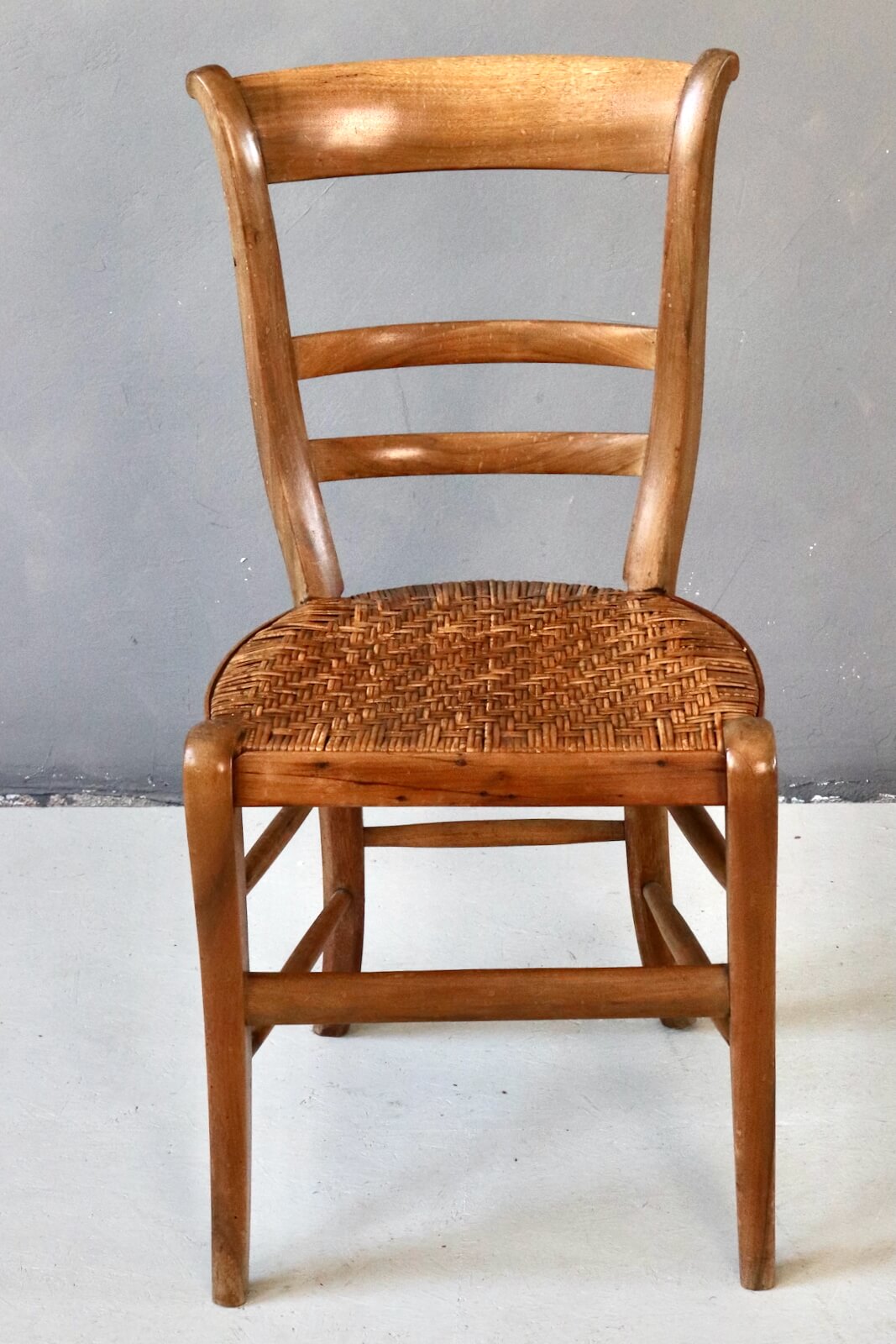 Antique wooden chair with wickerwork Antique wooden chair with wickerwork