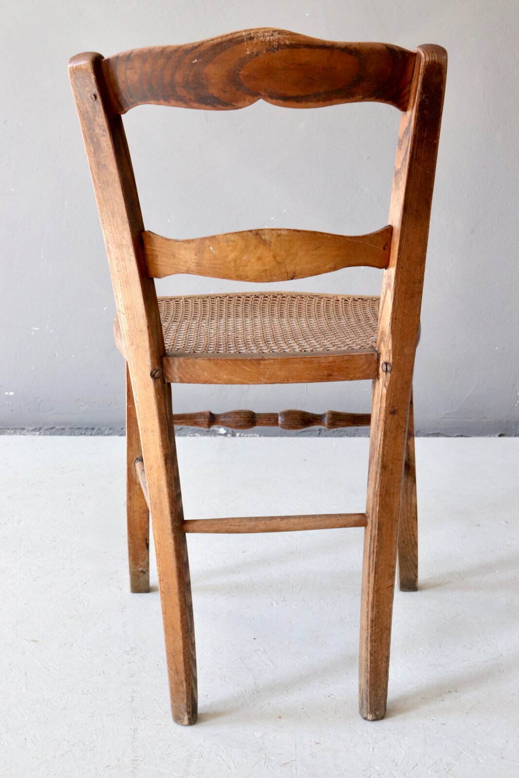 Antique wooden chair with wickerwork Antique wooden chair with wickerwork
