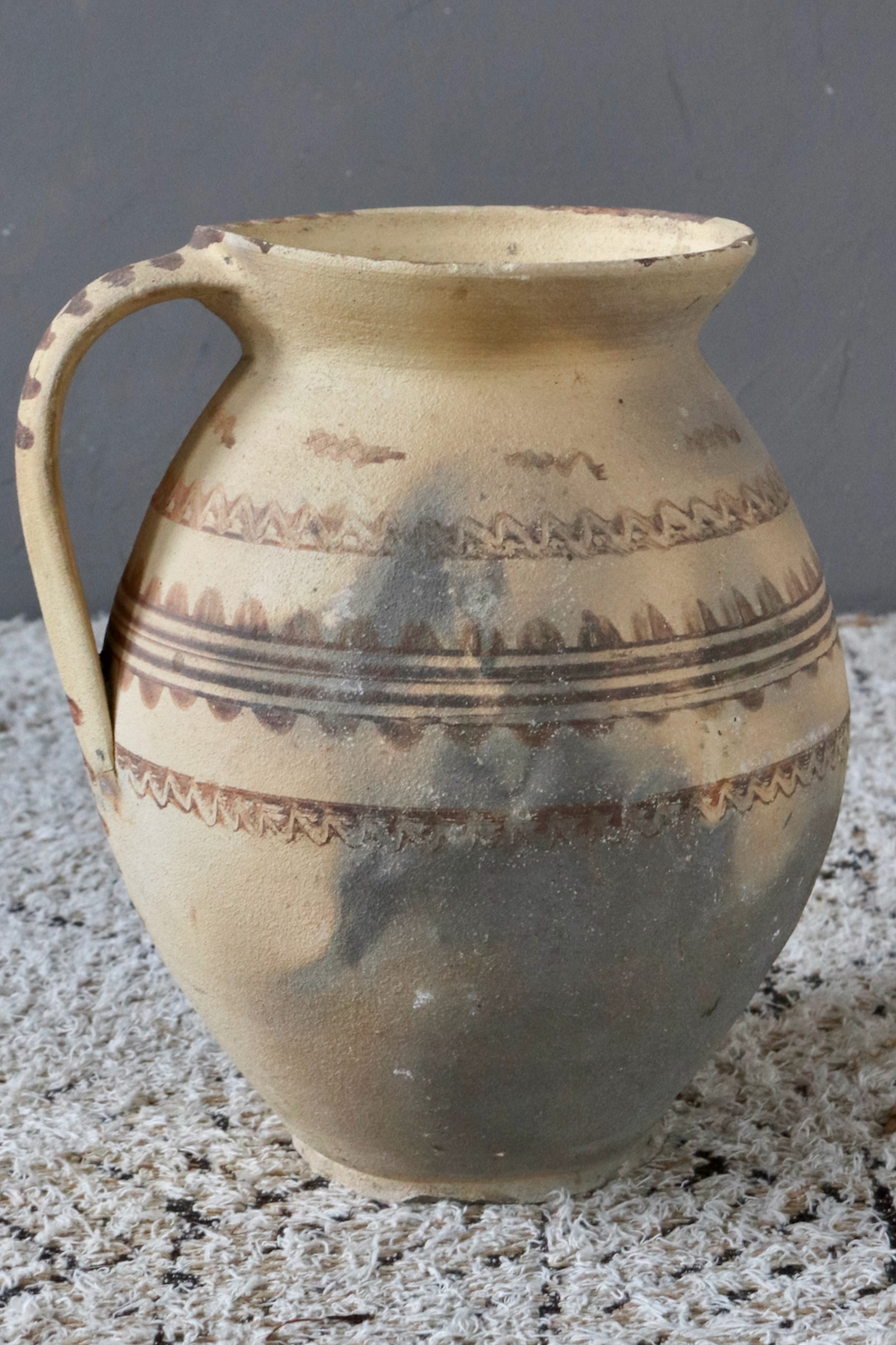 Antique terracotta jug