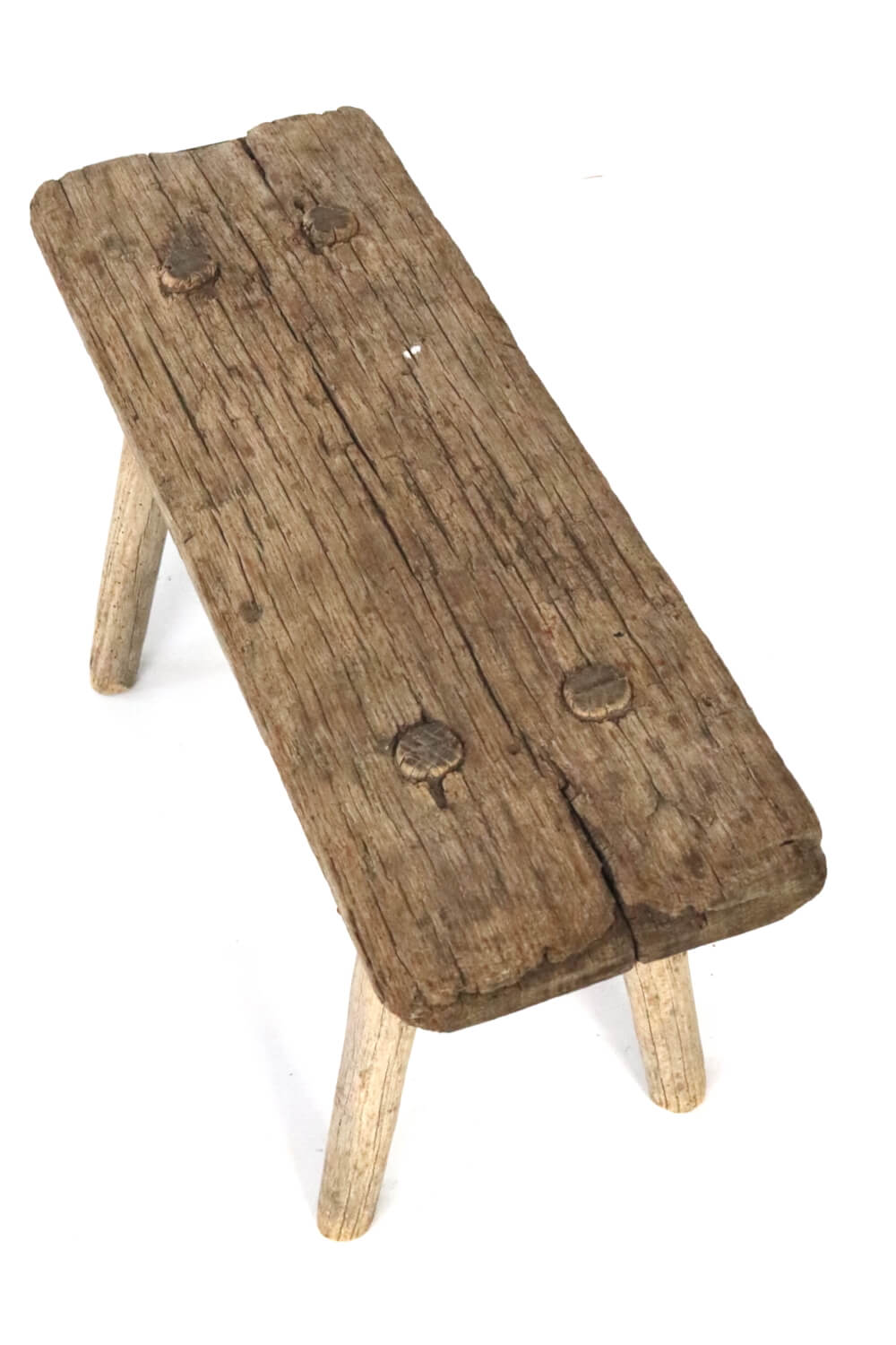 Old rustic farmers stool