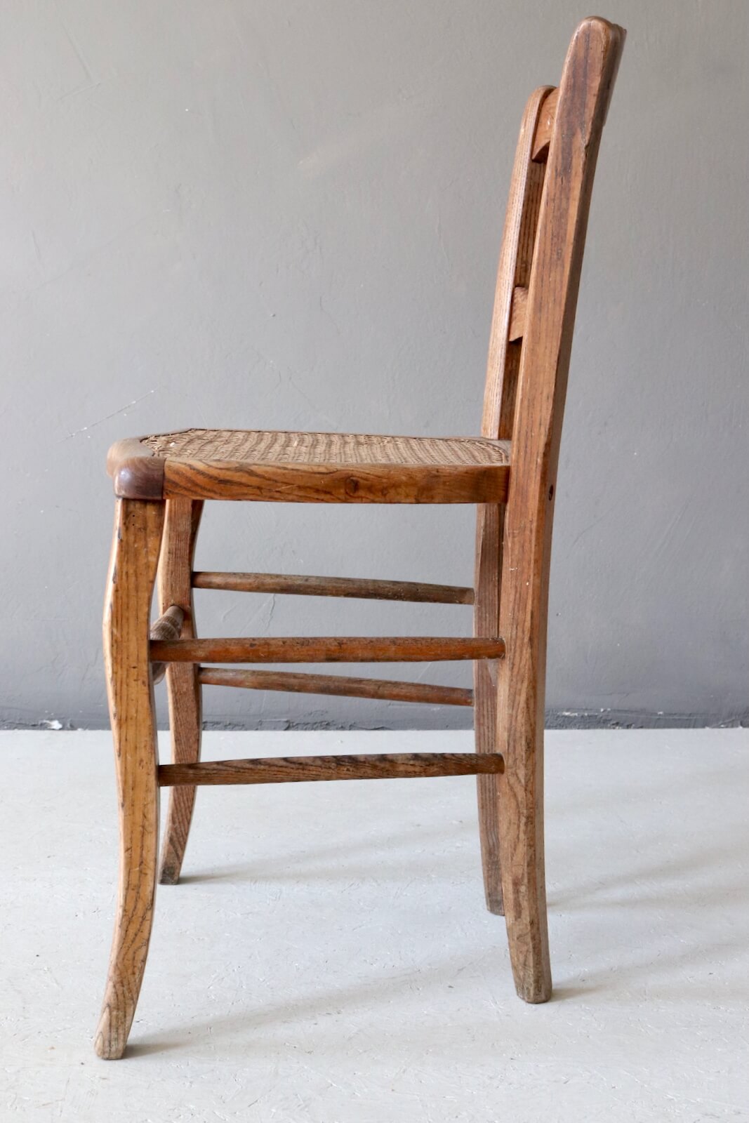 Antique wooden chair with wickerwork Antique wooden chair with wickerwork