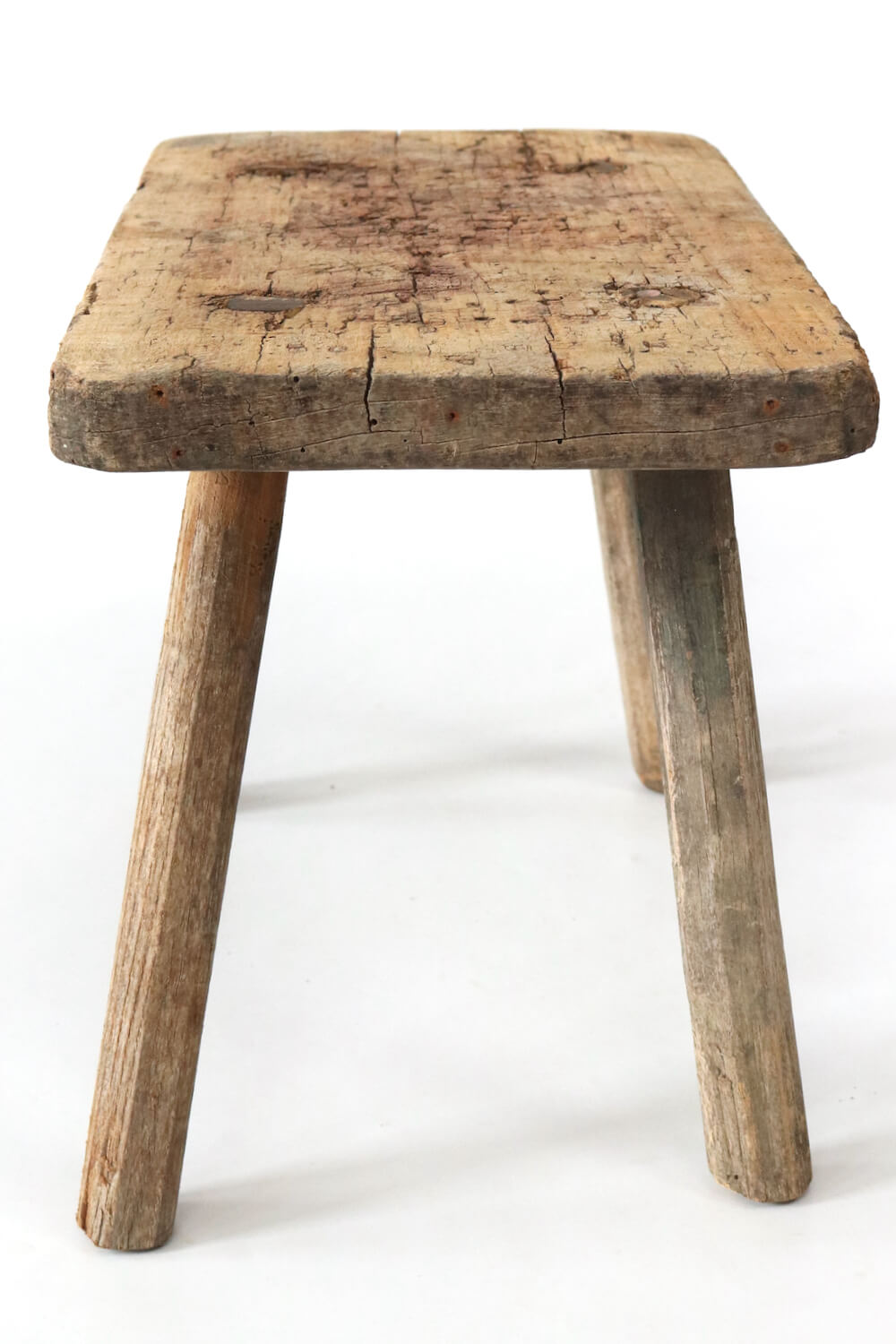 Old rustic farmers stool