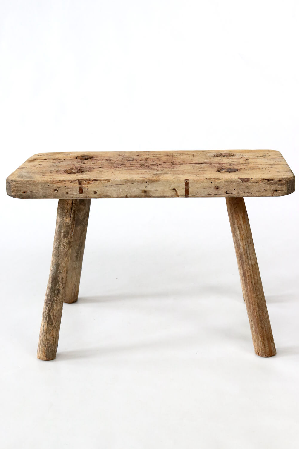 Old rustic farmers stool