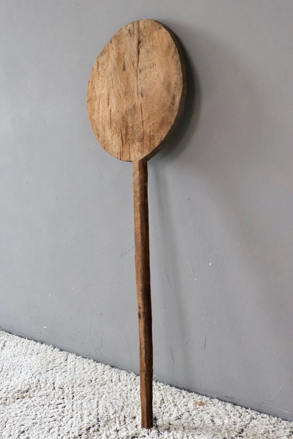 Ancient bread board with handle