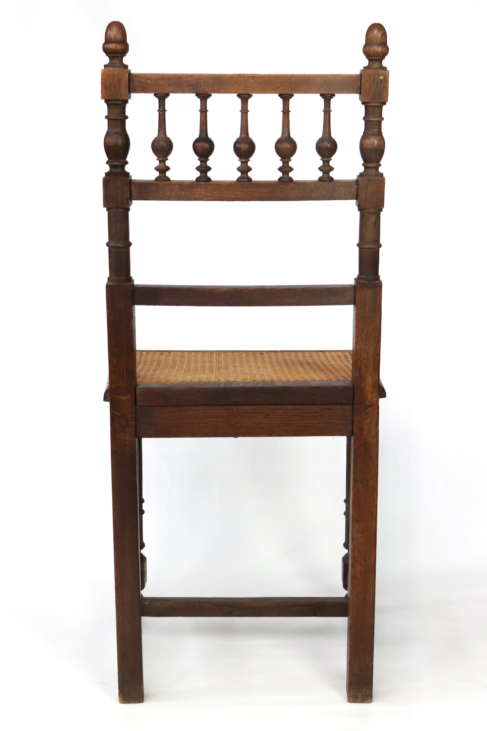 Antique wooden chair with wickerwork