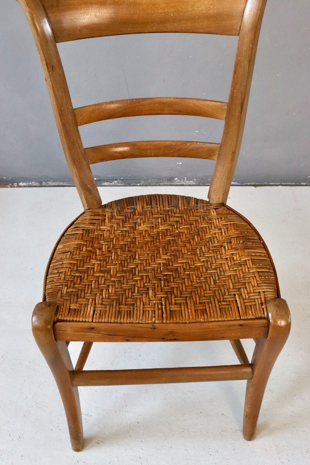 Antique wooden chair with wickerwork Antique wooden chair with wickerwork